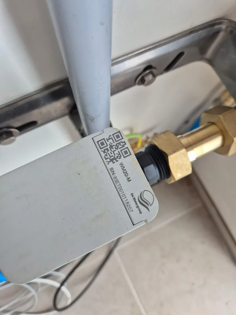 Digitale watermeter module WM20-M van De Watergroep bij een waterkeuring in Vlaanderen